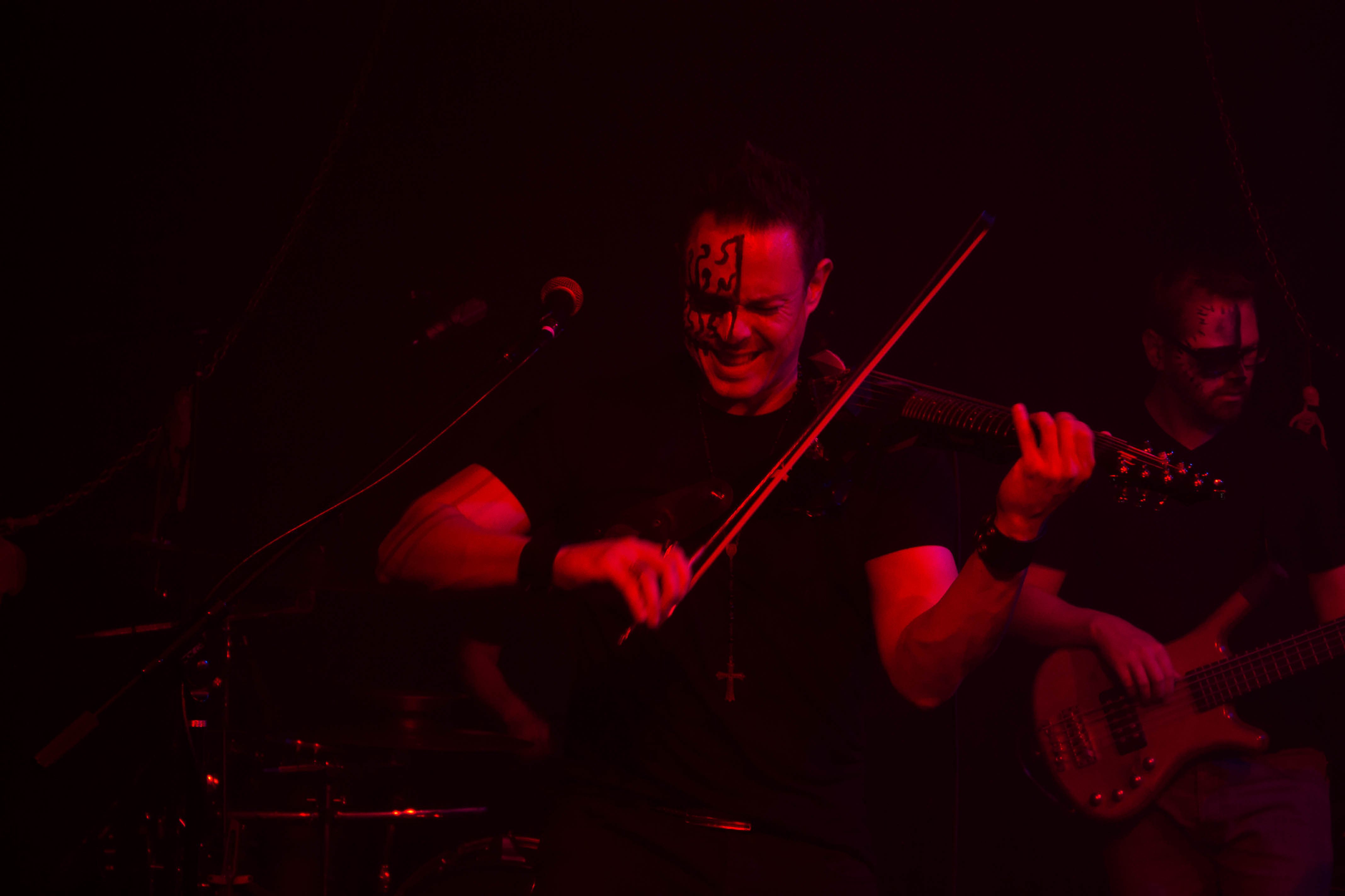 Haydn Vitera wailin on his electric violin during Tequila Rock Revolution's Local Live Set | Photo by Craig Casler